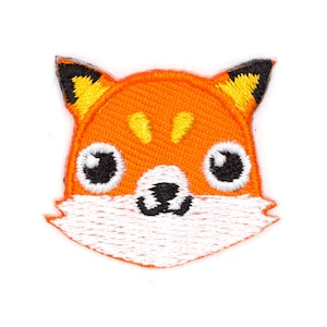 May include: Orange and white embroidered iron-on patch of a fox face with black eyes.
