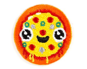 May include: A round, embroidered iron-on patch of a smiling pizza with red, green, and white toppings. The pizza has a yellow crust and a red, orange, and yellow border.