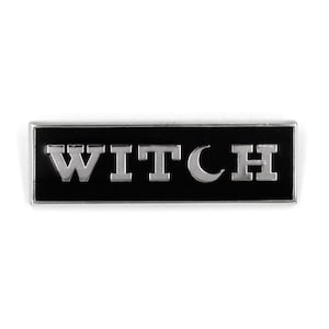 May include: Black enamel pin with silver lettering that reads "WITCH" with a crescent moon replacing the "O".