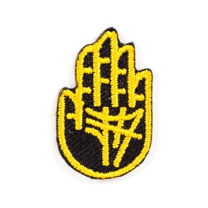 May include: A black and yellow embroidered patch in the shape of a hand with a detailed design inside.
