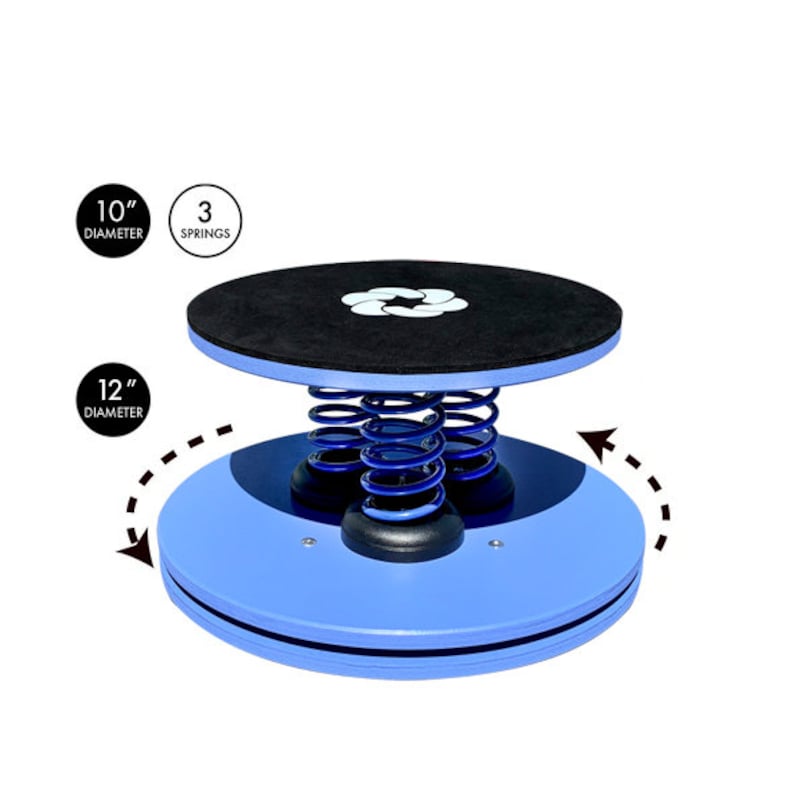 Puede incluir: Tabla de equilibrio azul y negra con tres muelles azules. La plataforma superior es negra con un dise&ntilde;o floral blanco. La base es azul claro y tiene 30 cm de di&aacute;metro. Texto: opci&oacute;n de 25 cm de di&aacute;metro.