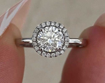 0.70ct GIA-Certified Round Brilliant Cut Diamond Engagement Ring. Handcrafted in 18k White Gold Ring.