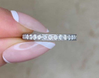 0.68ct Round Brilliant Cut Eternity Diamond Wedding Band. Handcrafted Platinum on 18K Yellow Gold Band.