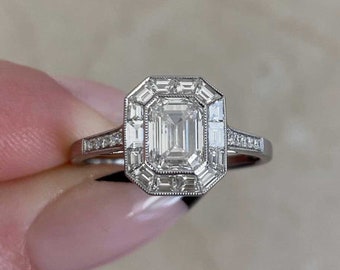 1ct GIA-Certified Emerald Cut Diamond Engagement Ring. Platinum Ring.