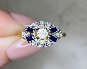 Antique Art Deco 0.15ct Old European Cut Diamond and Sapphire Engagement Ring, Circa 1920. Handcrafted Platinum on 18K Yellow Gold Ring.