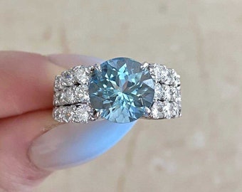 Vintage 3.71ct Round Brilliant Cut Diamond and Aquamarine Ring, Circa 1970. Handcrafted in 18K White Gold Ring.