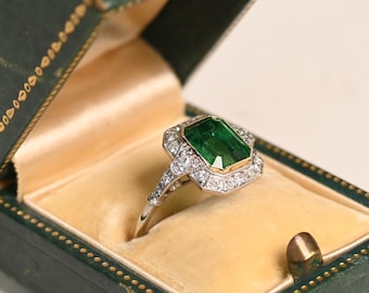 2center-ct Emerald Cut Natural Emerald Ring. Center of Halo Old European Cut Diamond Accent. Handcrafted Platinum 18K Yellow Gold Ring.