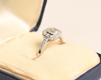 0.50center-ct GIA-Certified Asscher Cut Diamond Engagement Ring. Bezel Set Ring. Halo of Baguette-cut Diamond. Handcrafted in Platinum Ring.
