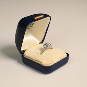 1center-ct GIA-Certified Antique Cushion Cut Diamond Engagement Ring. Halo-Style Diamond Ring. Platinum Ring. G Color and SI1 Clarity.
