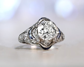 Antique Art Deco 1.49 Carat Old European Cut Diamond and Sapphire Engagement Ring, Circa 1920. Handcrafted Platinum Ring.