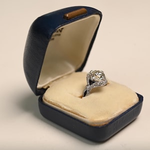Charlton Art Deco Era Ring. 2.15center-ct Old European Cut Diamond and Onyx Ring, Circa 1925.  K Color and VS1 Clarity. Platinum Ring.