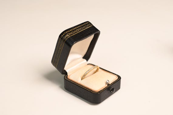 Vintage Style Round Brilliant Cut Diamond Wedding Band. Channel Set Diamond Wedding Band. Made in an 18K Yellow Gold Diamond Wedding Band.