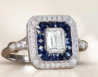 0.51ct GIA-Certified Emerald Cut Diamond Engagement Ring with a Halo Sapphire Accent. Handcrafted Platinum Ring.