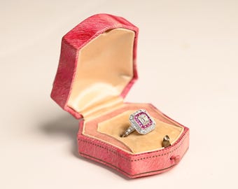 0.52center-ct Emerald Cut Diamond Ring. Double Halo of Diamonds and Rubies Accent. Handcrafted in Platinum Ring. J Color and VS1 Clarity.