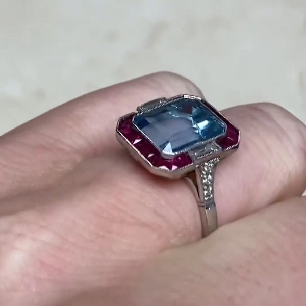 3center-ct Emerald Cut Rich Light Blue Aquamarine and Diamond Ring. Halo of Caliber Cut Rubies Set Ring. Handcrafted in Platinum Ring.