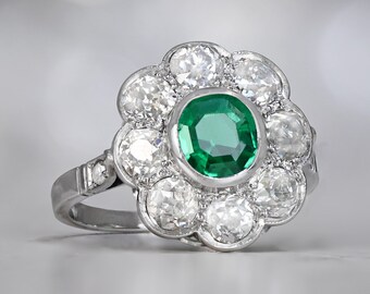 1ct Edwardian Style Oval Cut  Emerald Ring with a Halo Diamond Accent, Circa 1915. Handcrafted Platinum Ring.