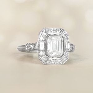 Sale - 0.80ct GIA-Certified Emerald Cut Diamond Engagement Ring. Platinum Ring.