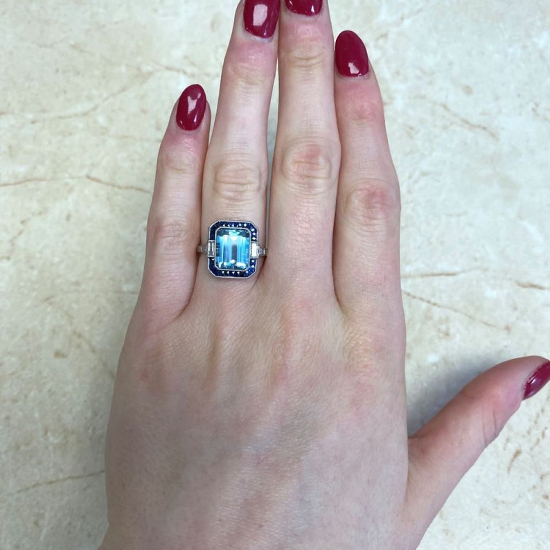 Emerald-Cut Aquamarine and Diamond Ring with Halo Sapphire Accent. Platinum Ring. image 6