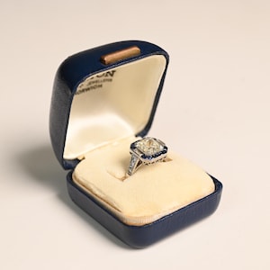 3.08center-ct GIA-Certified Asscher Cut Diamond Ring. Bezel Set Diamond Ring. French Cut Halo Sapphire Accent. Handcrafted in Platinum Ring.