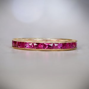 0.85ct French Cut Ruby Band. Handcrafted in 18K Yellow Gold Band.