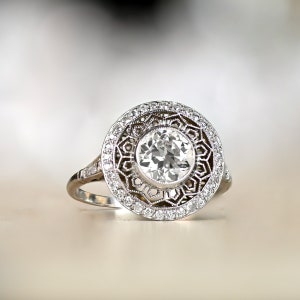 1.12 Carat Old European Cut Diamond Engagement Ring - Center Stone Surrounded by Open-Work and Diamond Halo