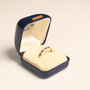 0.34center-ct French Cut Sapphire and Diamond Wedding Band. Channel Set with French Sapphire Cut. Handcrafted in 18K Yellow Gold Band.
