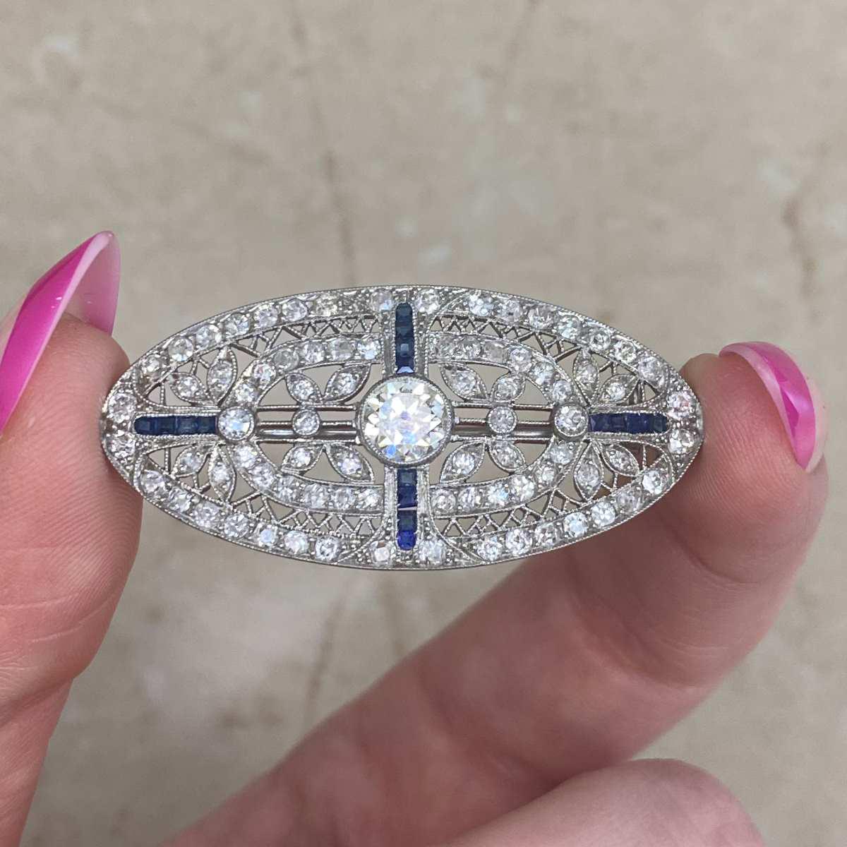 Edwardian 0.90center-ct Diamond and Sapphire Brooches. Floral Lace Design Sapphire Brooch, Circa 1915, Handcrafted in Platinum Brooch.