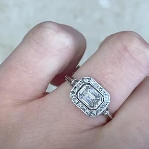 0.75center-ct GIA-Certified Emerald Cut Diamond Ring. Bezel Set with Halo of Old Mine Cut Diamonds Ring. Handcrafted in Platinum Ring.