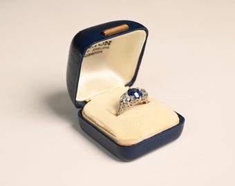 Three-Stone Sapphire Engagement Ring. 3.06center-ct GIA-Certified Cushion Cut Sapphire Ring set Triangular Prong. Handcrafted Platinum Ring.