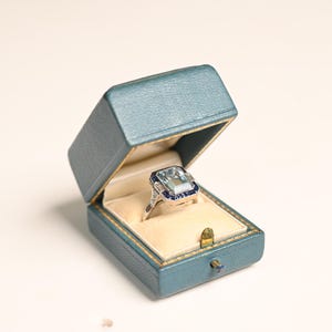 3.40center-ct Aquamarine Sapphire and Diamond Ring. Natural Emerald Cut with Halo of Sapphire Calibre Diamond Ring. Made in Platinum Ring.