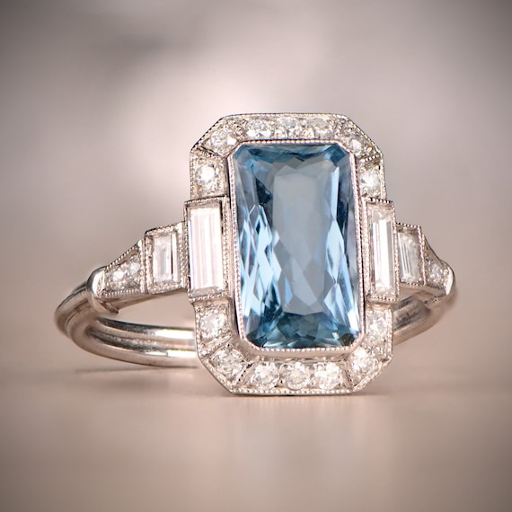 1.70ct Cushion Cut Aquamarine Ring With a Halo Diamond Accent 
