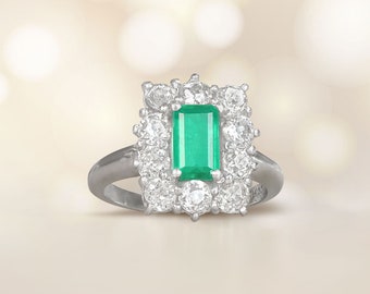 Antique Art Deco 1.25ct Emerald Cut Emerald Ring with a Halo Diamond Accent, Circa 1920. Handcrafted Platinum Ring.