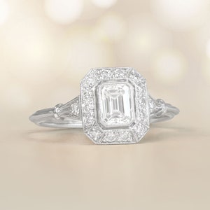 0.51ct Emerald Cut Diamond Engagement Ring. Platinum Ring.