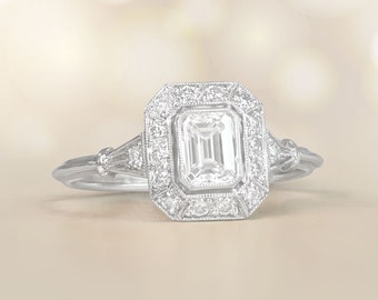 0.51ct Emerald Cut Diamond Engagement Ring. Platinum Ring.