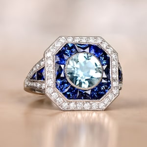 1.03ct Round Cut Aquamarine and Diamond Ring with Halo Sapphire Accent. Handcrafted Platinum Ring.
