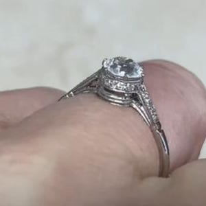 0.59center-ct Old European Cut Diamond Ring. Smaller Old European Cut Diamond Accent. Handcrafted Platinum Ring. G Color and SI1 Clarity.