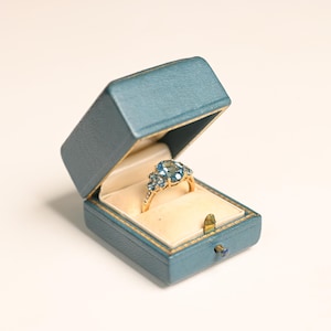 4.39center-ct Oval Cut Blue London Topaz Ring. Prong Set Topaz Ring. November Birthstone Ring. Handcrafted in 18K Yellow Gold Ring.