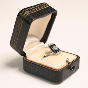 Art Deco 0.20center-ct Onyx and Diamond Ring. Old European Cut Ring. J Color and VS2 Clarity, Circa 1920. Handcrafted in Platinum Ring.