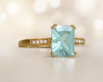 1.52ct Emerald Cut Aquamarine and Diamond Engagement Ring. Handcrafted in 18K Yellow Gold Ring.