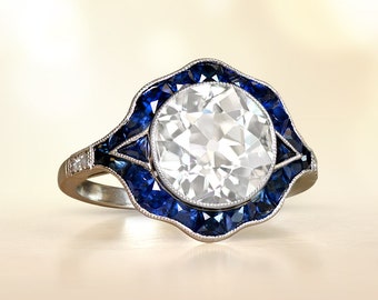 3.01 Carat Old European Cut Diamond and French Cut Sapphire Halo Ring