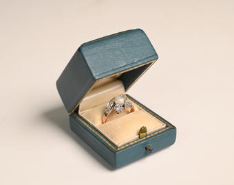 Antique Edwardian 0.35center-ct Three-Stone Old Mine Cut Diamond Engagement Ring, Circa 1900. Handcrafted Platinum on 18K Yellow Gold Ring.