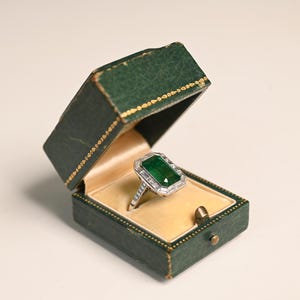 5.65center-ct  Emerald  Cut Engagement Ring with Halo Diamond Accent. Handcrafted Platinum Ring.