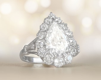 2.09ct Cluster Pear-Shaped Diamond Ring. Pronged Platinum Ring.
