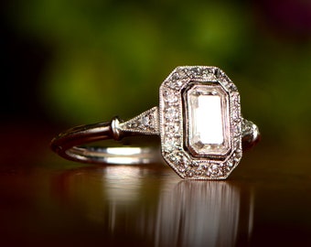 Halo Engagement Ring - 0.51 Carat Emerald-Cut Diamond with Additional 0.36 Carat Diamond Halo