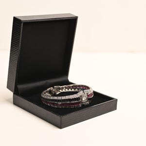 Antique Art Deco 6center-ct Old European Diamond and Onyx Bracelet, Circa 1920. Channel-set Baguette-cut Onyx and Ruby. Platinum Bracelet.