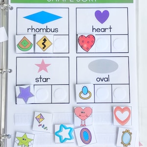 May include: A printable shape sort activity for kids. The page has four sections with different shapes: rhombus, heart, star, and oval. Each section has three spaces for children to place the corresponding shapes. The shapes are colorful and have fun designs.