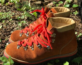 old hiking boots with red laces