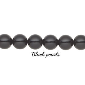 May include: A strand of glossy, black pearls. The round beads are strung together, with the text "Black pearls" in a cursive font below the pearls. The pearls are set against a white background.
