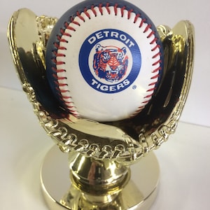 Golden Baseball Glove With Golden Ball Riser