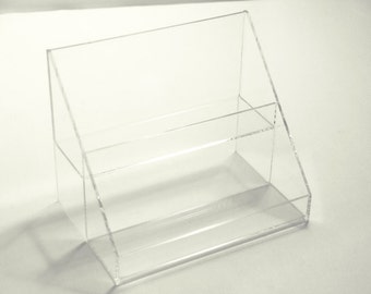Custom acrylic plastic fabrication store displays jewelry trays brochure holders showcases racks shelves plexiglas lucite exhibits covers